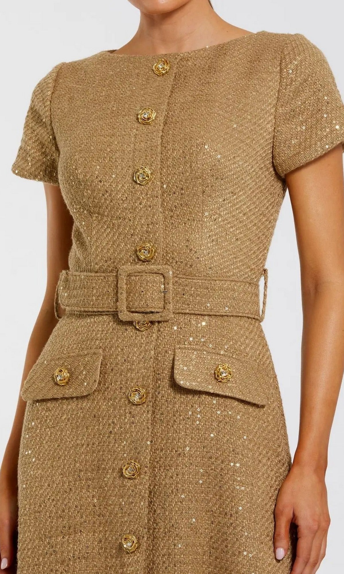 A woman wears the Mac Duggal 21166 gold boucle midi wedding guest dress, featuring short sleeves, a belted waist, button-up front, and two front flap pockets.
